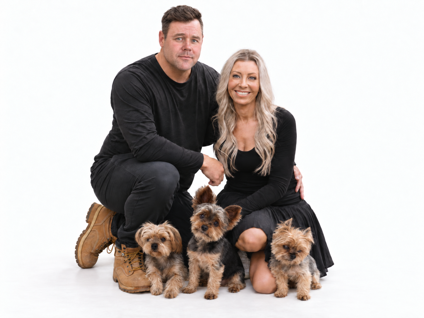 Katie and Alex with their three Yorkshire Terriers